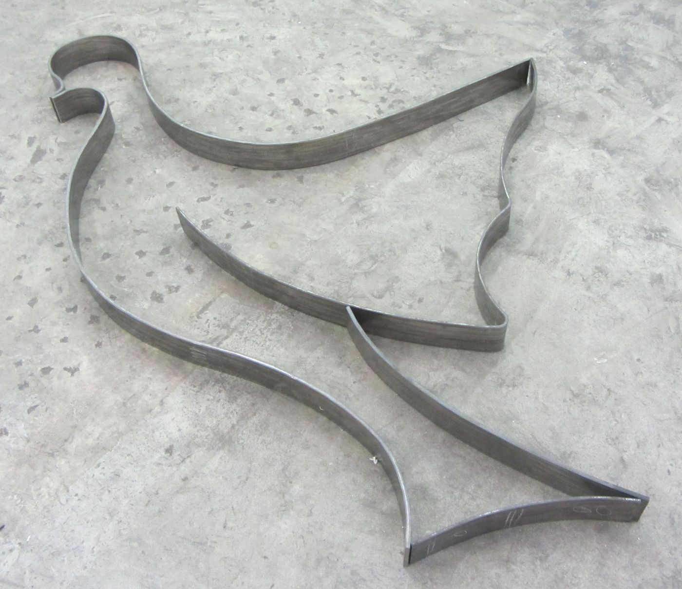 sculpture en fer forgé réalisée par Stephan Poirier, création d'ours de rhinocéros et girafes sur commande